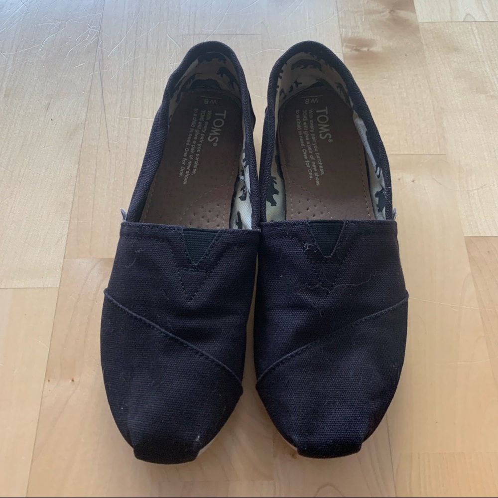 Black Toms slip on shoes